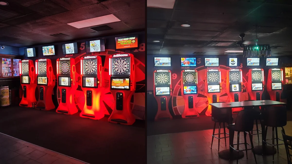 Darts area with drinks and pub seating.